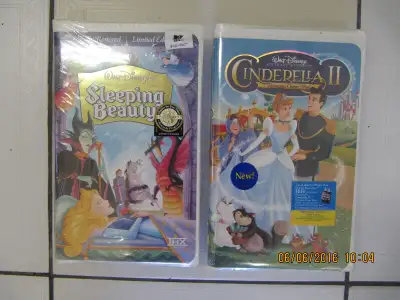 Up for sale is a lot of two Walt Disneys Pictures Sleeping Beauty and Cinderella II movies still bra...