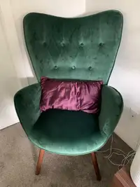 2 forest green velveteen chairs with wooden legs