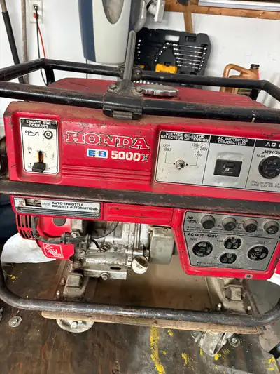 Used older Honda generator 5000watts manual start runs and generates power but needs tune up or fine...