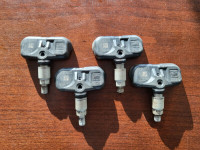 Set of 4 Toyota OEM TPMS Sensors – Part # PA66-GF33 PMV-107J