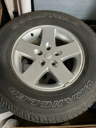 Set of 4 wheels. OEM rims in very good condition. Tires 60% tread 2007 to 2019 jeep wrangler wheels.