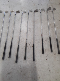 An assortment of golf clubs