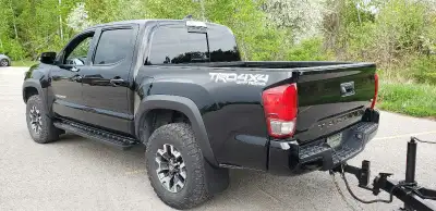 Selling my reliable 2017 Toyota Tacoma TRD Off-Road along with a versatile enclosed 5'×8' Halmark tr...