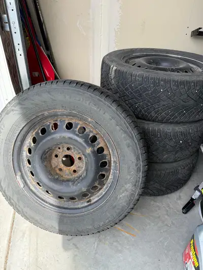 Winter tires with rims for sale. Excellent condition only used for 2 winter seasons. Did not use thi...
