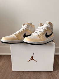 Womans Air Jordan 1 mid coconut milk black size us9.5