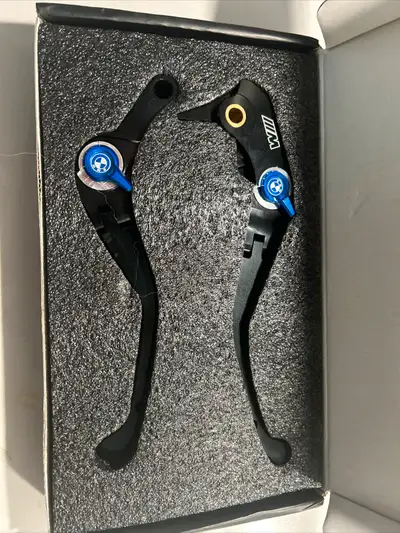 Brand new, in box and never used or mounted BMW M clutch and brake levers. Fully adjustable forward...
