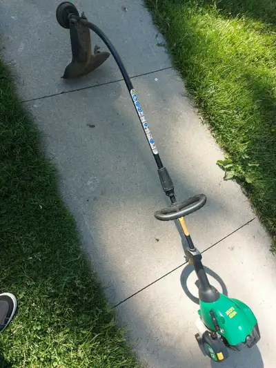 Running trimmer WEED EATER brand. Runs and trims as it should.