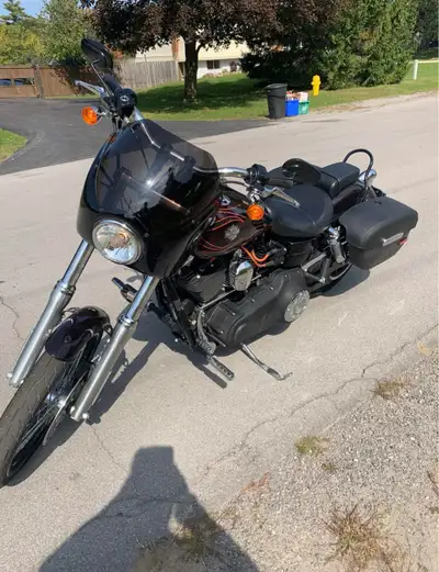 2014 Dyna 103ci. Fuel injection absolutely pristine. Too many add ins to list. Come take a look.very...