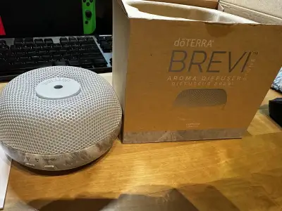 Enhance your space with this doTERRA Brevi diffuser, perfect for dispersing essential oils and creat...