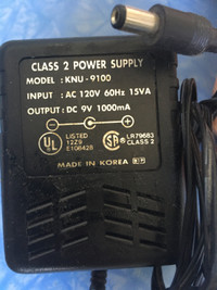 AC Adapter Model # KNU-9100  9VDC 1 Amp