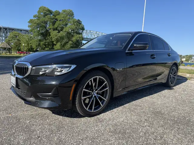 BMW330e like new. Sarnia