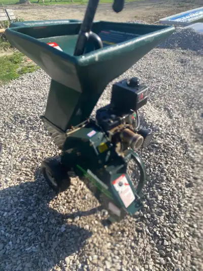 Good shape: wood chipper or shredder 5 hp Tecumseh engine too, small for my needs Open to Reasonable...
