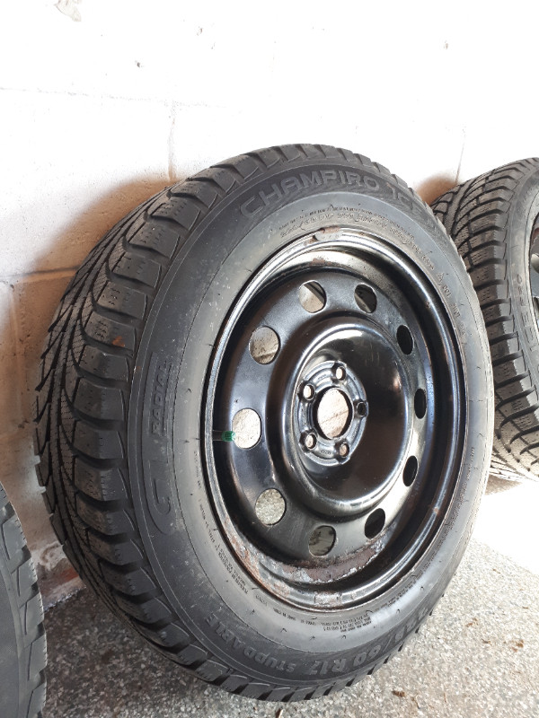 Winter tires on metal rims in Tires & Rims in Oshawa / Durham Region