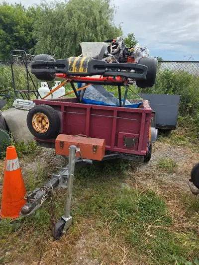 Excellent utility trailer. With gate that opens and an excellent heavy duty cover with hinges that o...