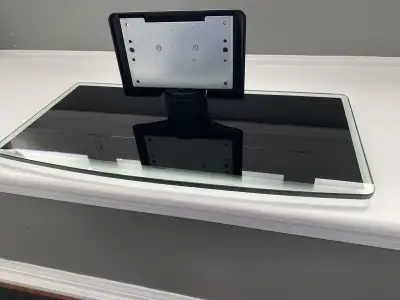 New tempered glass pedestal swivel TV stand from a 60” RCA Plasma TV. Call/Text/WhatsApp me if your...