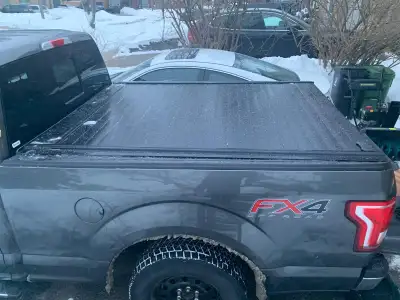 Off a 2015 F150 6.5' bed. Will fit a 2015-2020 F150 truck bed. Retrax retractable tonneau cover. Key...