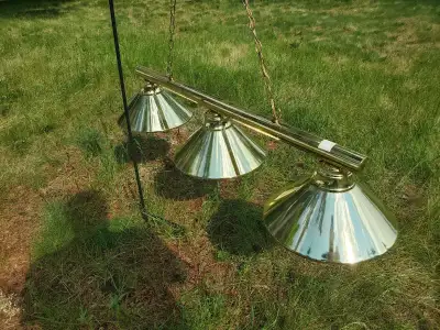 This Z-Lite Concord pool table light features a polished brass bar with three matching cone shades....