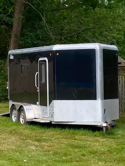 Premium Legend all aluminum, ramp door, extra height (78” door/84” inside), aluminum rims, spare tir...