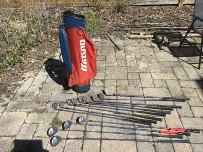 Golf clubs and carry bag $75, View more