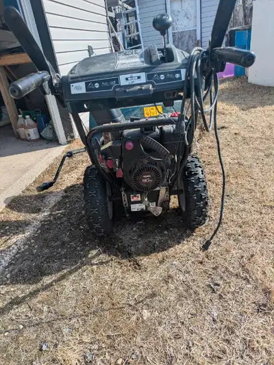 26" yard machine snowblower by mtd. It has electric start. And will start and run. Could use a tune...