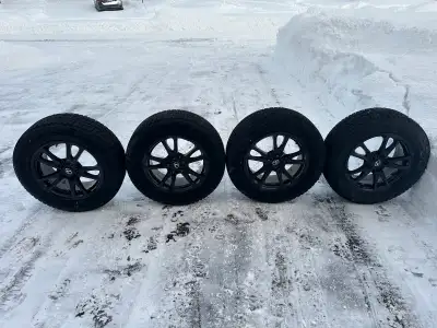Excellent condition winter tires on alloy rims. Rims are off a 2016 Lexus NX. Tires have only seen t...