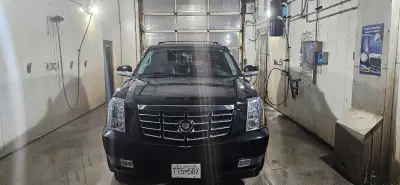 09 Escalade AWD 159000km 6.2l on studded winters. Aftermarket apple/android wireless play newer roto...