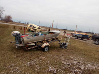 12ft tin boat trailer and motor 