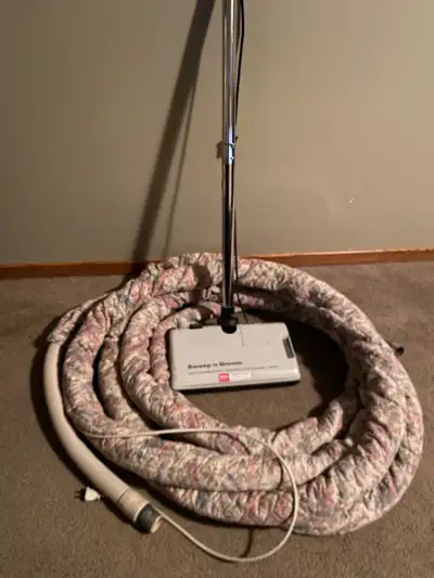 30 foot hose with fabric sleeve. Sweep and Groom power nozzle. All in good working order.