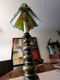 Vintage brass lamp With stained glass shade.