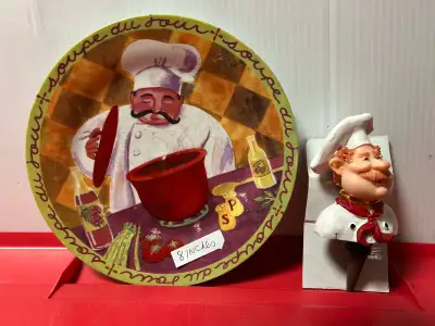 A chef-themed plate, measuring approximately 8 inches in diameter, paired with a matching chef bust...