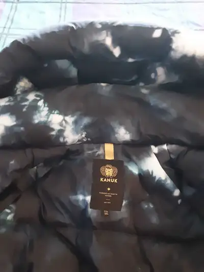 Manteau Kanuck long pour homme en très bonne état., View more