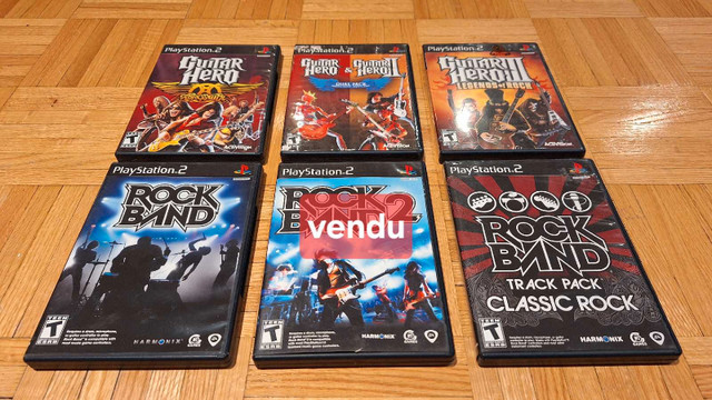 6 jeux Guitar Hero, Rock Band (PS2) dans Consoles classiques  à Laval/Rive Nord
