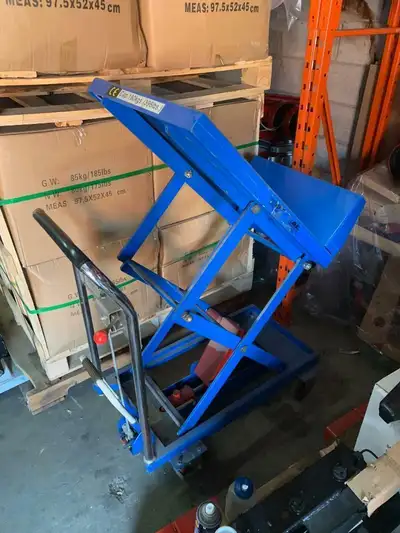 Used lift, tilt scissor table, View more