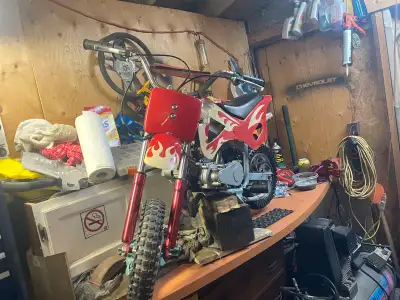 49 cc Pocket Bike / Pit Bike Spent a few bucks on parts, runs and rides. Body’s seen better days but...
