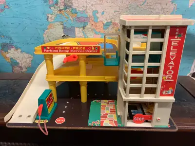 See pics. It’s been played with lots. Stickers worn, but otherwise solid, and it works. Elevator goe...