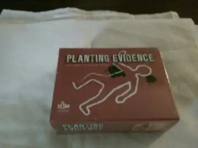 Planting Evidence card game -NEW/sealed 14+, View more