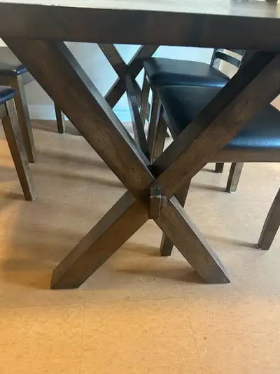 solid dark wood table and 4 chairs, View more