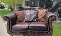 Beautiful leather love seat couch futon. 