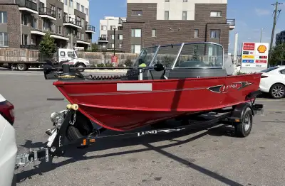 For sale is a red 2014 Lund 1625 Lund Fury XL with walk-through windshield and 60HP Yamaha motor for...