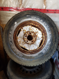 New spare on rusty ford rim