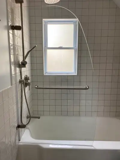 34" W x 58" H Includes: moveable glass door (swings outward), brushed nickel hinges & towel bar Requ...