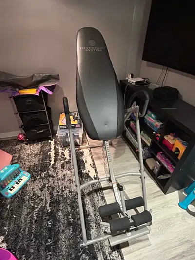 Selling inversion table in great condition, adjustable height and tilt from 0-180 degrees