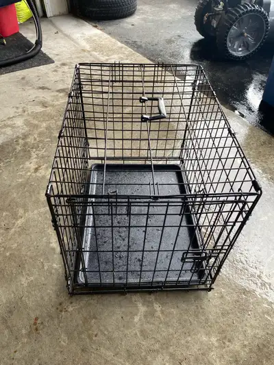 Used for a Shitzu puppy.... Barely used it though Dimensions are: 2ft by 1.5ft by 1.7ft WANT GONE AS...