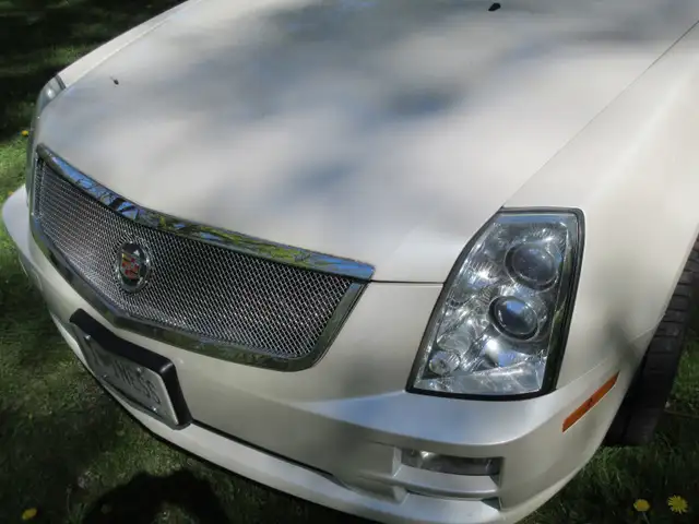SHOWROOM CONDITION - GORGEOUS CADI STS AWD 121,000 KL62930785120513122