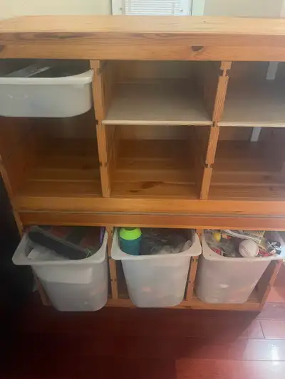 Ikea Trofast storage. We screwed brackets in the shelf to secure against the wall. There are scratch...