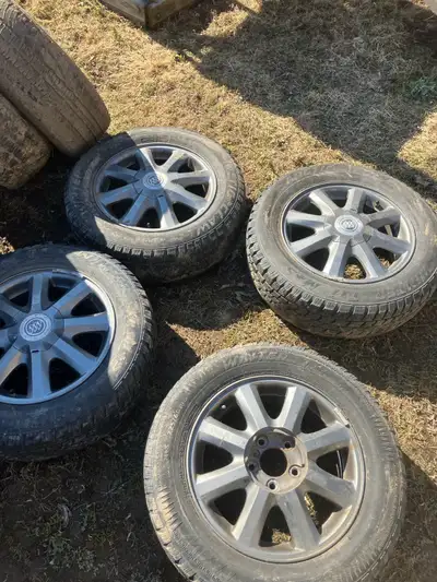 5 lug stock buick allure car rims, tires are shot, needs new rubber, 150$ obo.