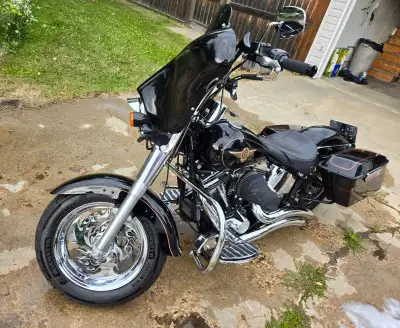 Selling my 1997 Fat boy low rider. Many extra: fearing with radio/bluetooth, hard saddle bags, custo...