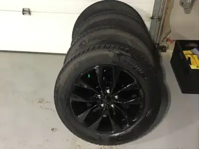235/60 R18, 107H XL Goodyear Winter Comand Ultra tires with DAI Gloss black rims 5X120, off a 2024 B...