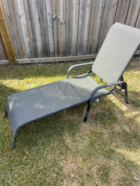 Reclining sun lounger with removable cushion