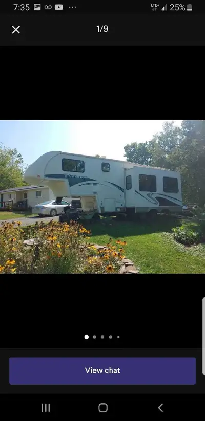 Twin slide outs that are apposing so makes extra wide kitchen area...this trailer is in very good co...